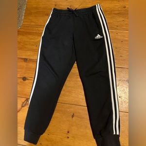Women’s black adidas sweatpants. Size medium, with waist band and string.